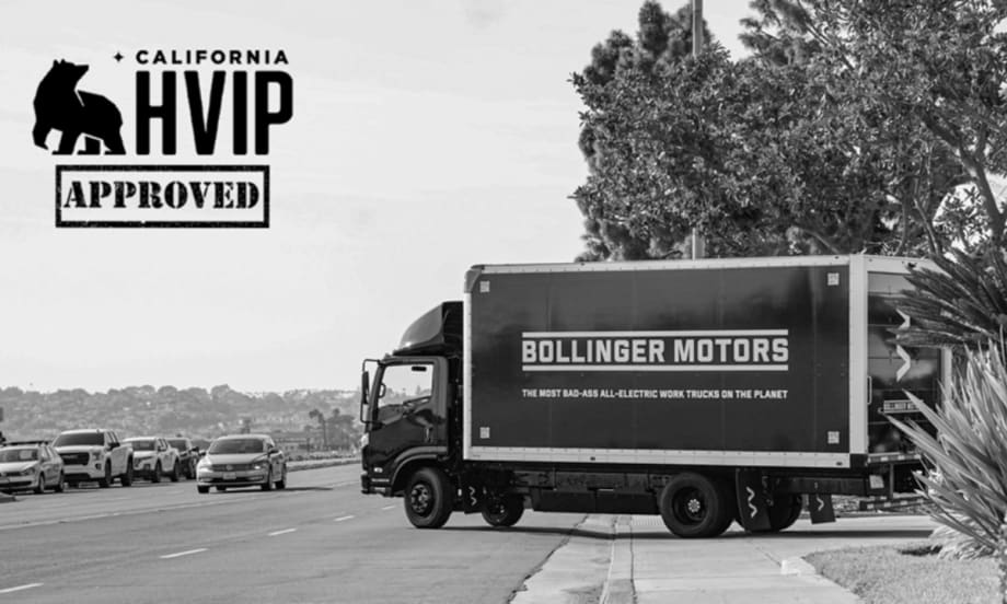 A black and white photo of a Bollinger Motors B4 EV Truck wit the California HVIP logo.