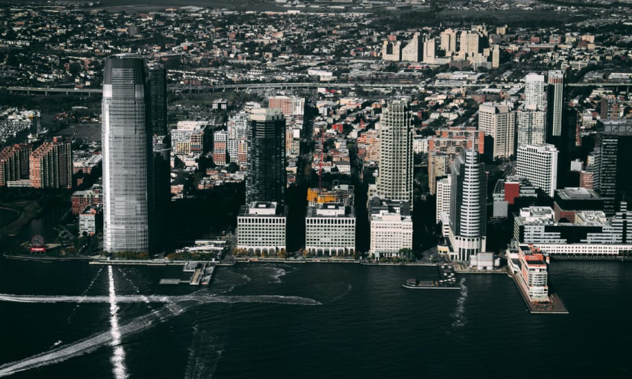An aerial photograph of Jersey City, New Jersey, during the day.