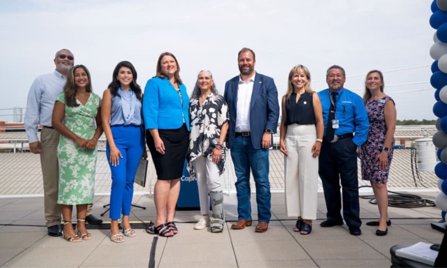 A group of CapMetro professionals posing for a photo.