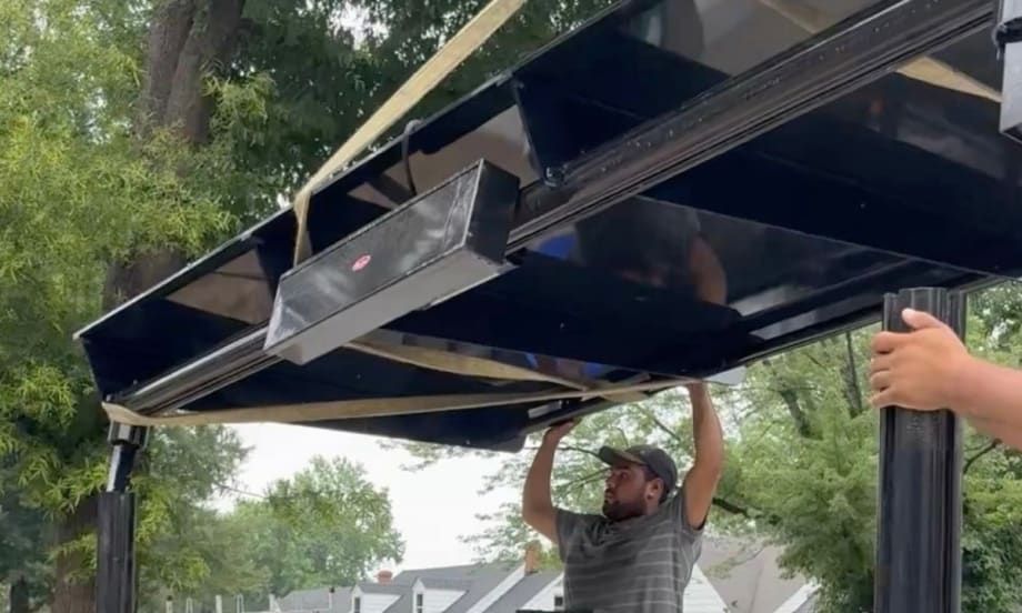 Workers constructing and upgraded a GRTC bus stop.