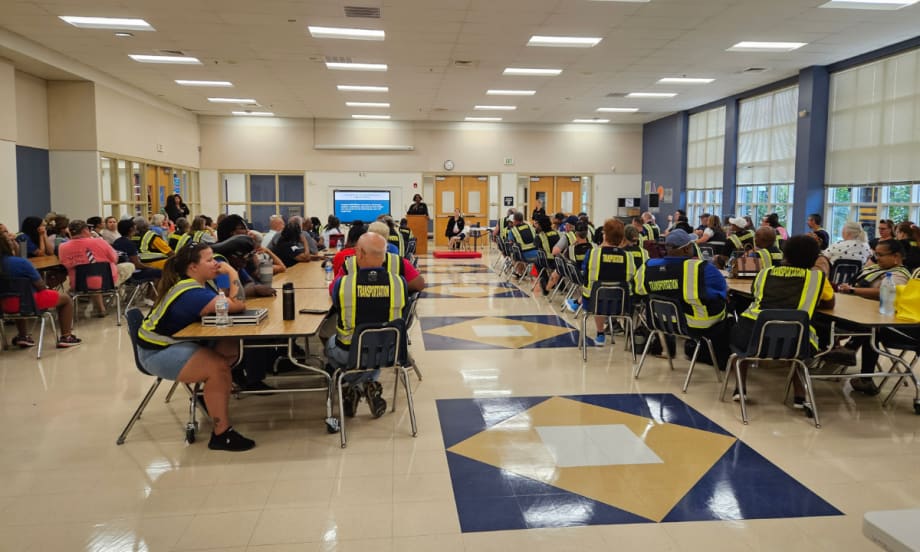 A classroom full of school bus drivers during a training day.