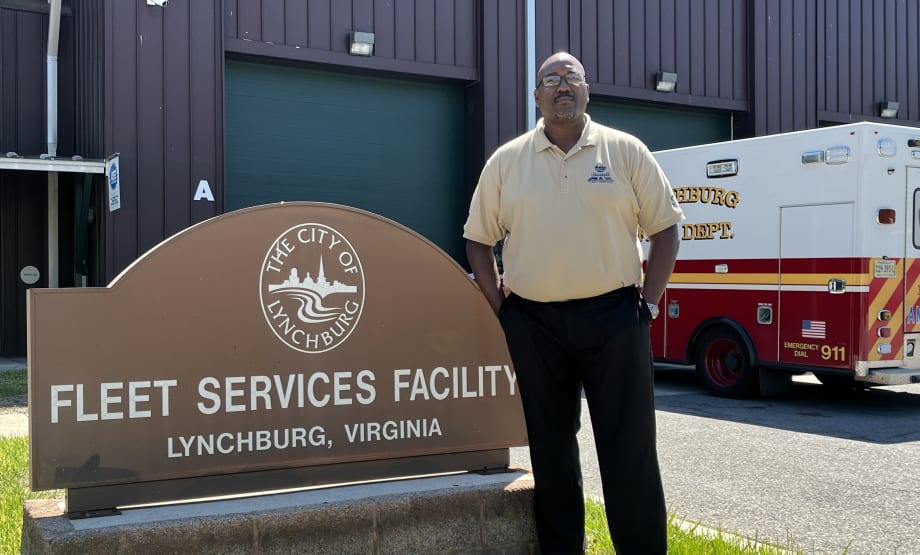 Ken Lett in front of the city fleet building.