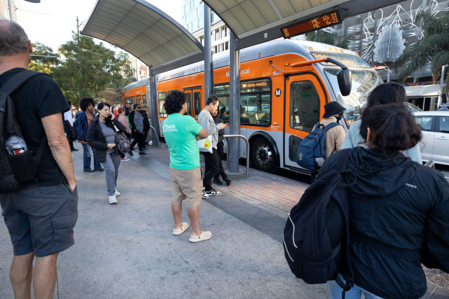 Passengers preparing to board LA Metro Bus