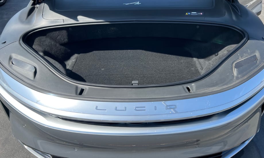 Open front trunk of a Lucid electric vehicle showing additional cargo space.
