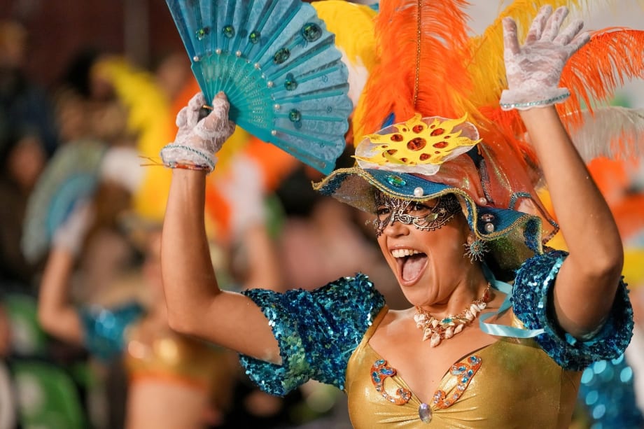 A woman in costume celebrates