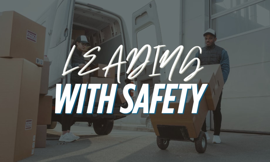 An image of people delivering boxes with text reading "Leading With Safety".