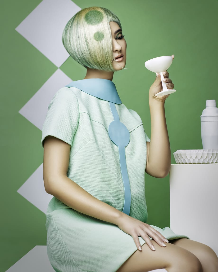 A woman with green hair