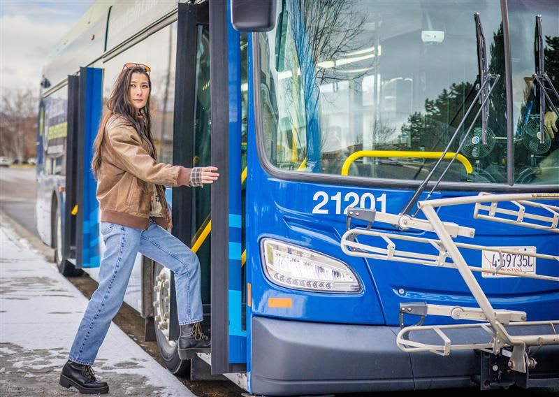 Mountain Line customer boarding a bus.