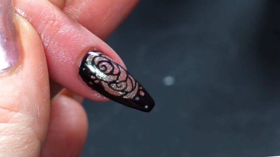 Reverse Stencil Rose Nail Design