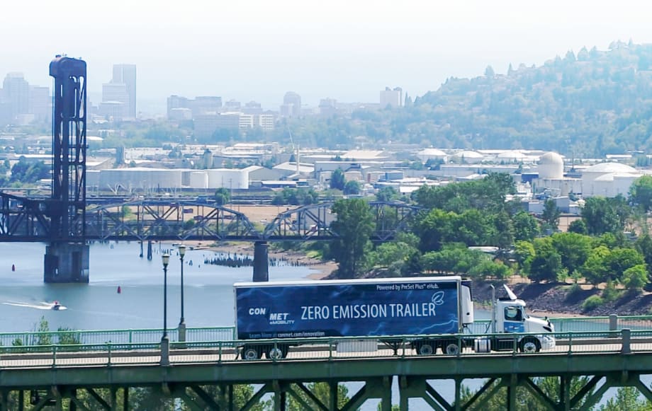 ConMet powered trailer crossing a bridge.