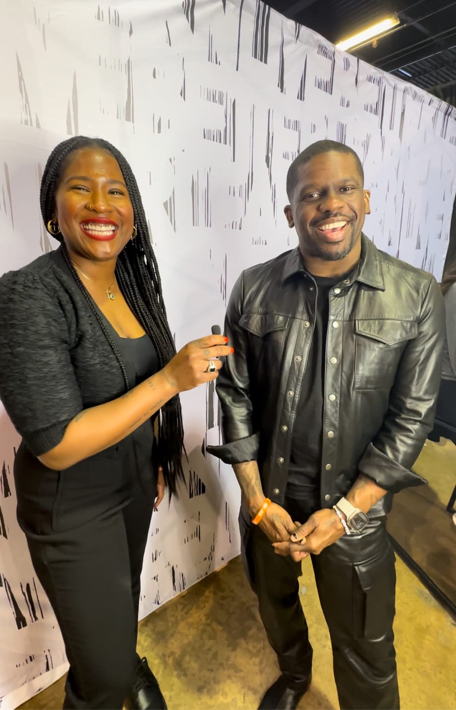 A smiling woman and man.