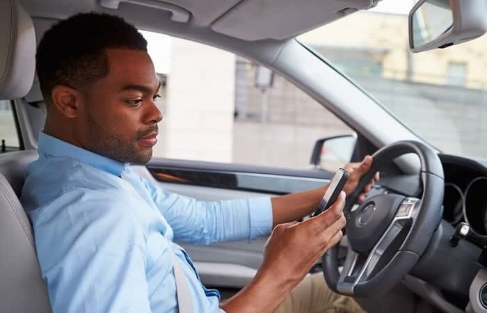 Work Demands Contribute to Distracted Driving Behaviors