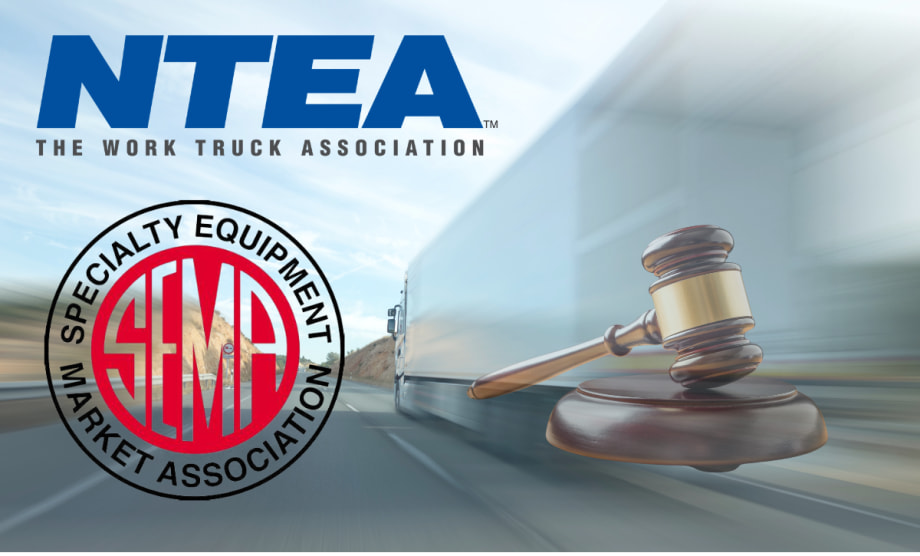 Image of truck with association logos and gavel