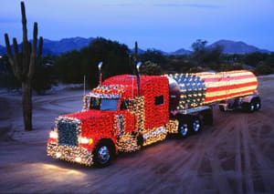 Giant Holiday Rig Dazzling Flag On Wheels