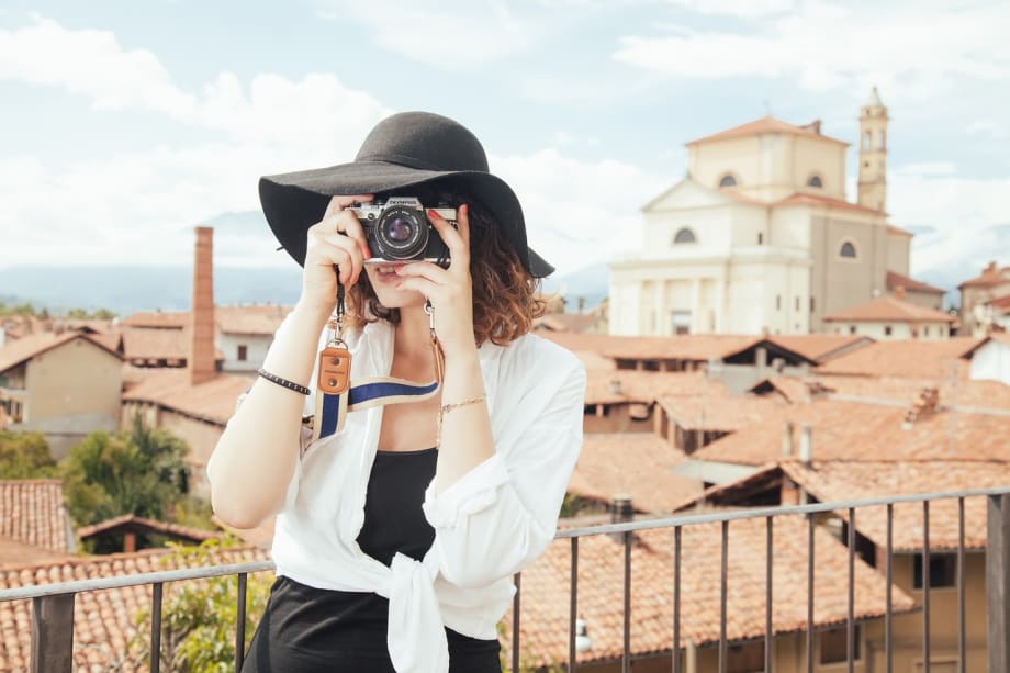 A woman taking a picture.