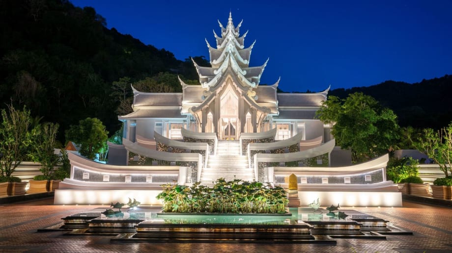The outside of a large temple in Thailand