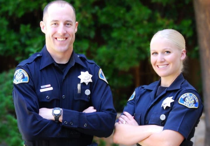Officers Save Two Sleeping Women from Burning Home