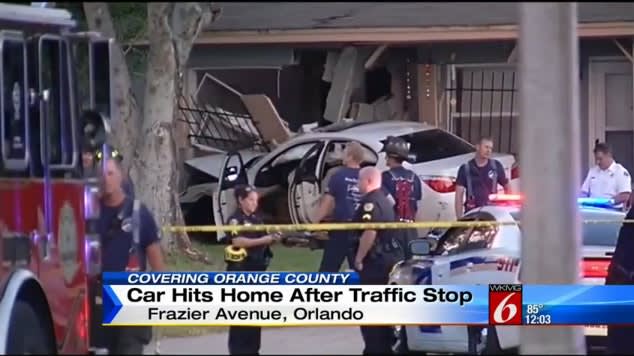 Car Hits House After Dragging Orlando Officer