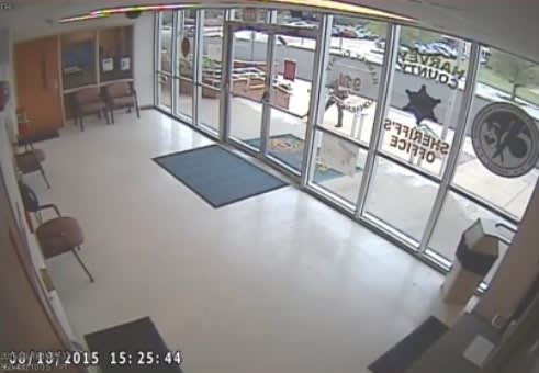 Video: Man Throws Bricks at Kansas Police Station