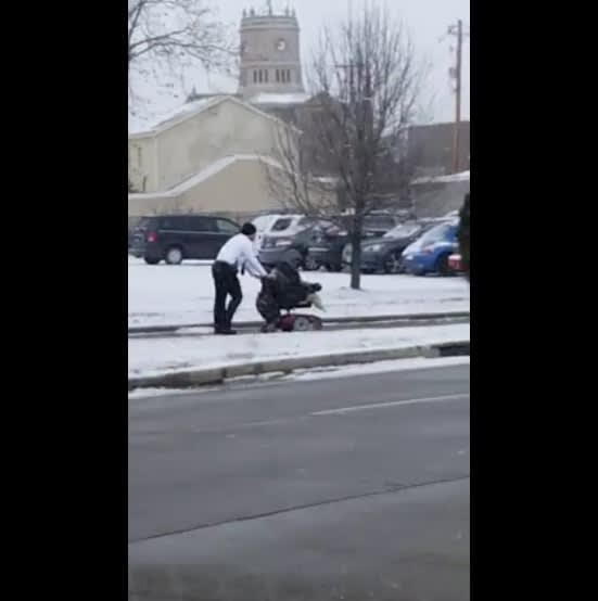 VIDEO: OH Officer Helps Veteran in Wheelchair Through Snow