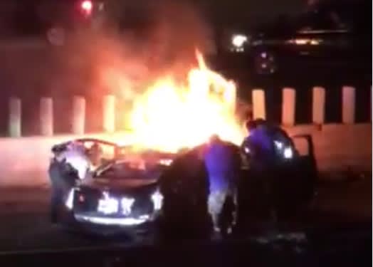 Video: Minneapolis Police, Passersby Pull Motorists From Burning Car