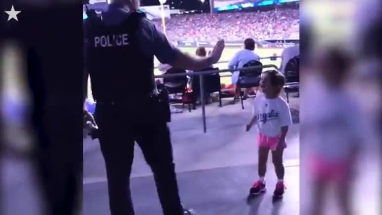 Video: MO Officer Dances with Little Girl at Baseball Game