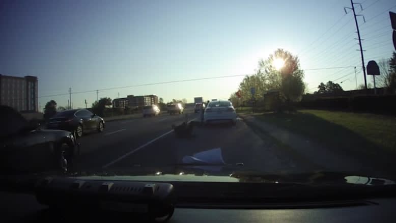 Video: Georgia Officer Dragged 1 Mile While Suspects Toss Guns from Car