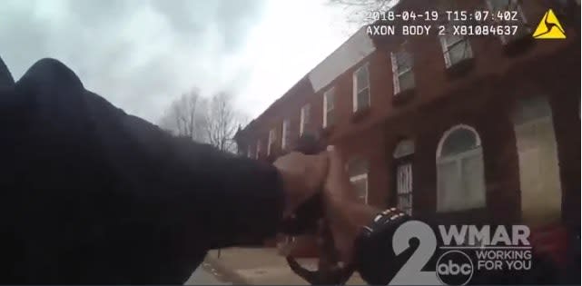 Video: Baltimore Officer Runs to the Sound of the Guns