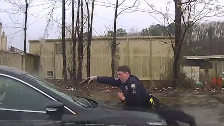 Video: Arkansas Officer Fires Into Car While on Hood in Deadly Shooting