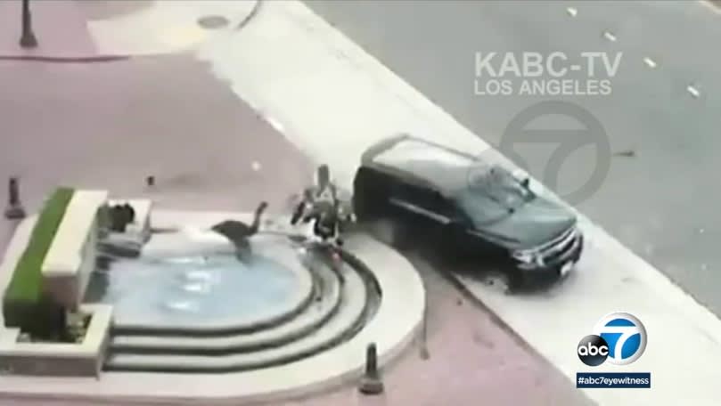 Video: Vehicle Crashes into LAPD Officer, Launches Him into Fountain