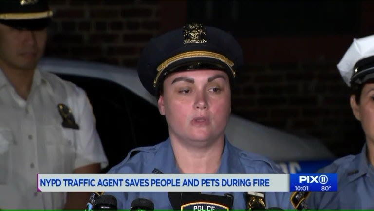 Video: NY Traffic Agent Rescues People, Dogs From Burning Homes