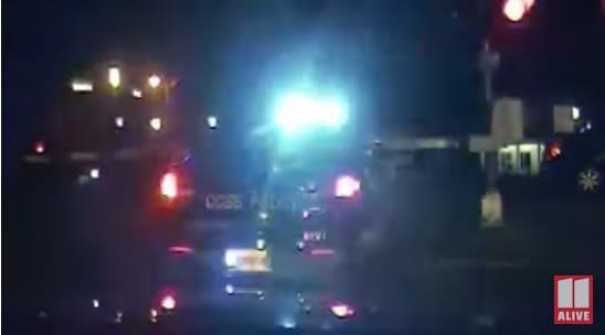 Video: GA Officers Rescue Man from Tracks Just Before Train Hits Car