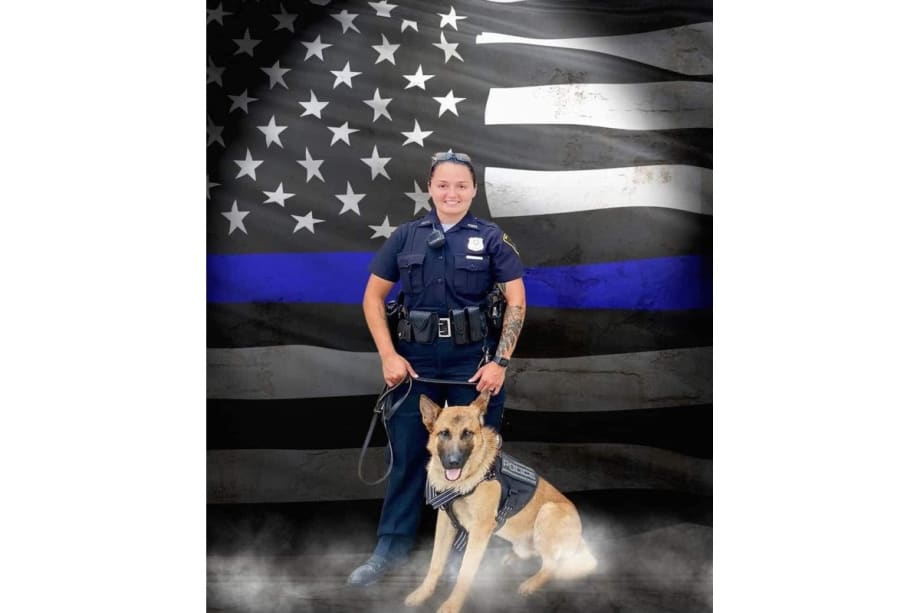 Fallen Richmond, IN, police officer Seara Burton with K-9 partner Brev. The dog has been retired. (Photo: Richmond PD)[|CREDIT|]