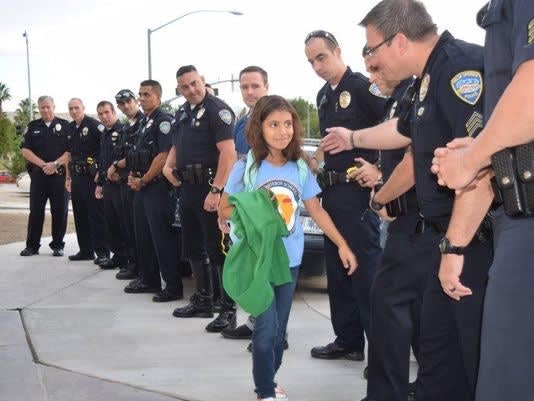 Palm Springs Officers Escort Fallen Comrade's Daughter to School