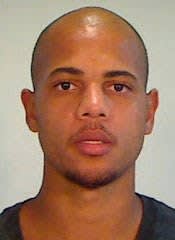 Florida Officer Shot in Vest, Suspect in Custody