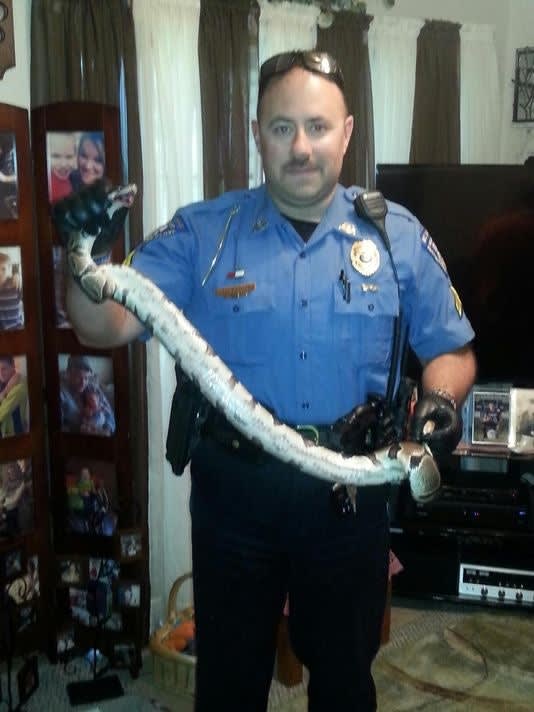 Missouri Officer Pulls Constricting Python Off Woman's Arm
