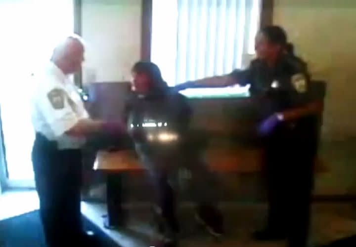 Video: Illinois Officers Use Force In Booking Room