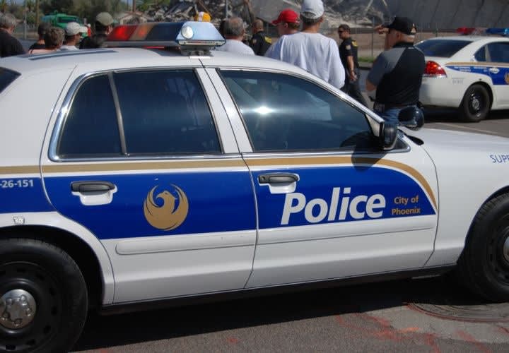 Demoted Ariz. Cops Sue City Over Crime Scene Slideshow