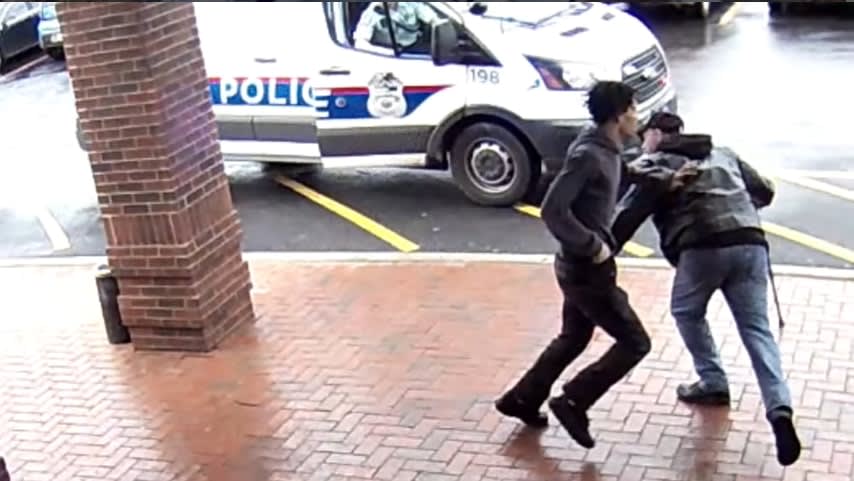 Video: Man with Cane Trips Armed Suspect Running from Ohio Officers