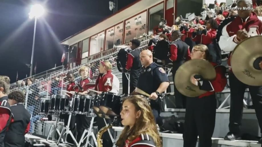 On a Dare, Arkansas Officer Joins High School Drumline at Football Game