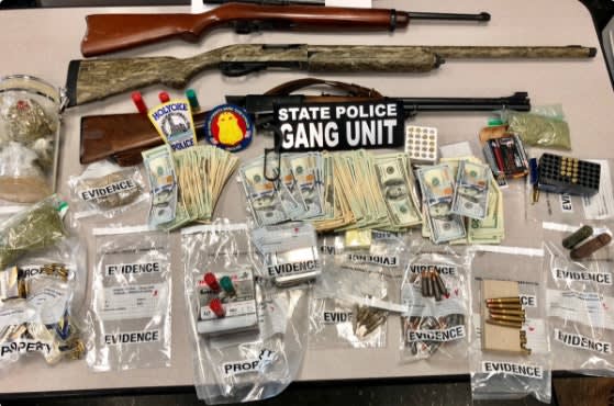 Massachusetts Police Seize Guns, Drugs, Cash in 4 Simultaneous Raids