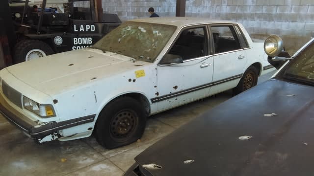 Matasareanu tried to get away in this Chevrolet Celebrity. LAPD officers shot out the front tires, foiling his escape. Photo: Los Angeles Police Museum/David Fryar