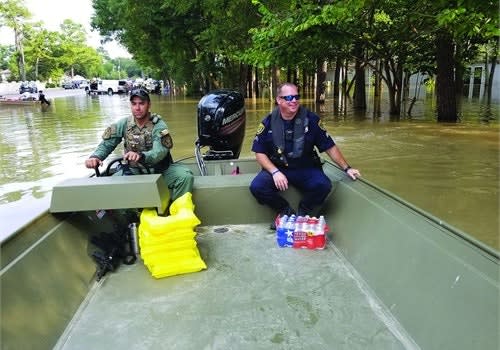 Most people picture boats when they think of citizens being rescued from flood waters after a hurricane hits. But all manner of vehicles can be repurposed to aid in rescue and recovery after a disaster. Photo: Houston PD/Flickr