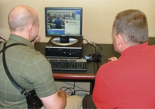 PHOTO: Ocean Systems. Fort Wayne detectives upload a file using Ocean Systems' solution for video analysis.