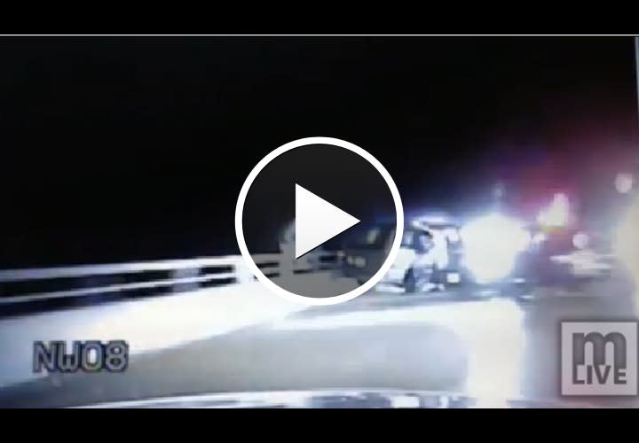 Video: Dashcam Shows MSP Trooper, Suspect Falling Off Bridge