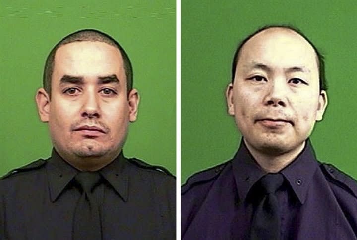 Families of Slain NYPD Officers Ramos and Liu Throw Out First Pitch at Mets Game