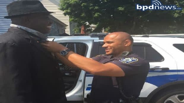 Boston Officer Helps Man Tie Necktie