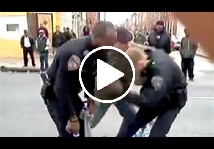 Video: Man Tackles Baltimore Cop During Arrest