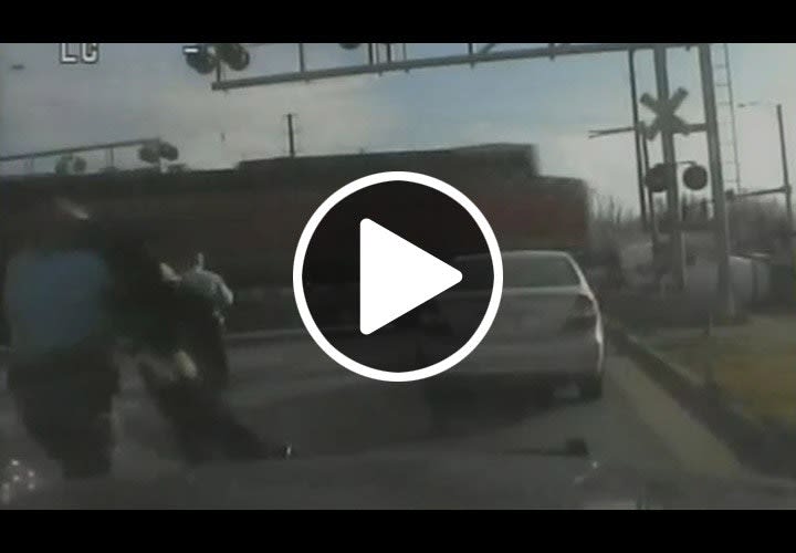 Video: Kan. Deputy Saves Trucker from Train