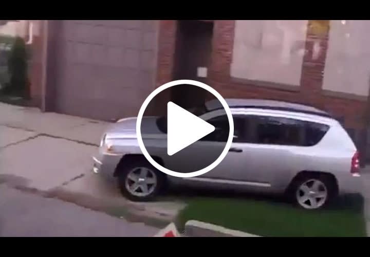 Video: Woman Must Wear 'Idiot' Sign for Driving on Sidewalk